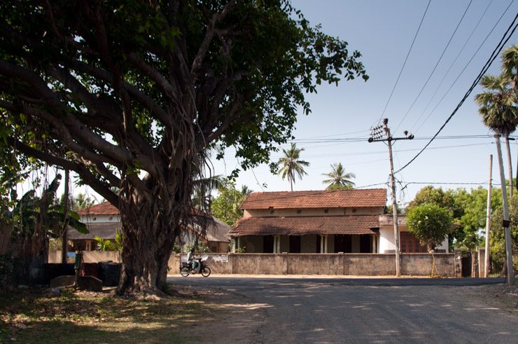 View of the home from the road. The small gate on the right leads to the house and the larger gate to the garden and land behind.