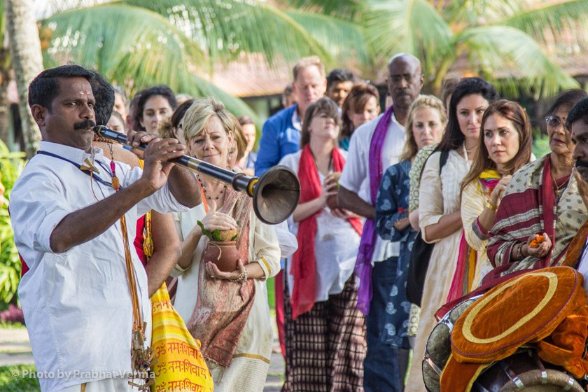 Two traditional temple musicians lead the parade to the sacred fire ceremony.
