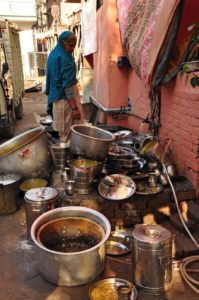 The daunting task of cleaning the piles of pots and plates after each meal