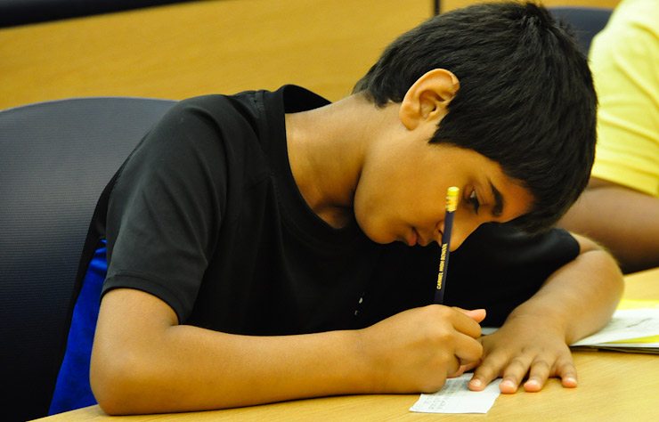 Children writing notes of gratitude and appreciation