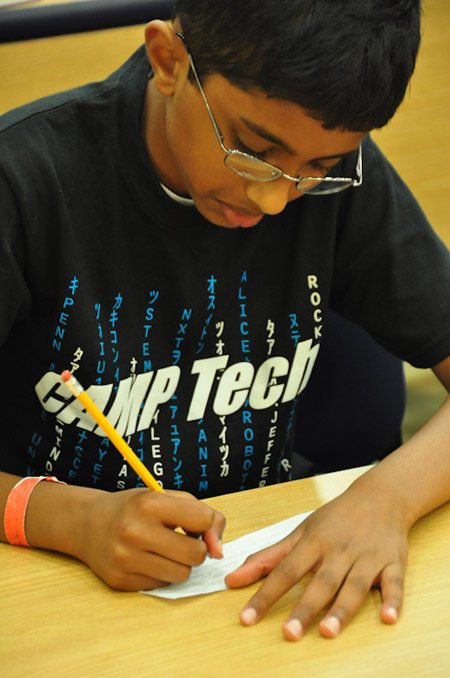 Children writing notes of gratitude and appreciation