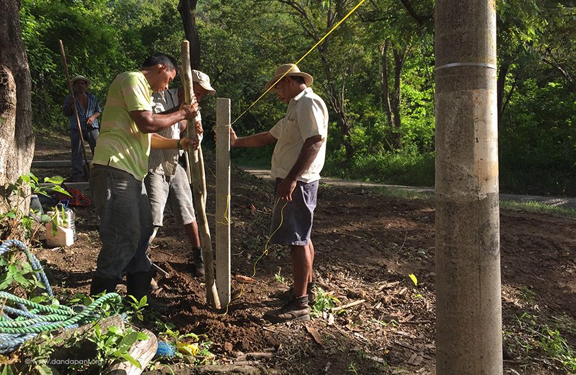 The team putting in new fence line on the northern border of Siva Ashram.